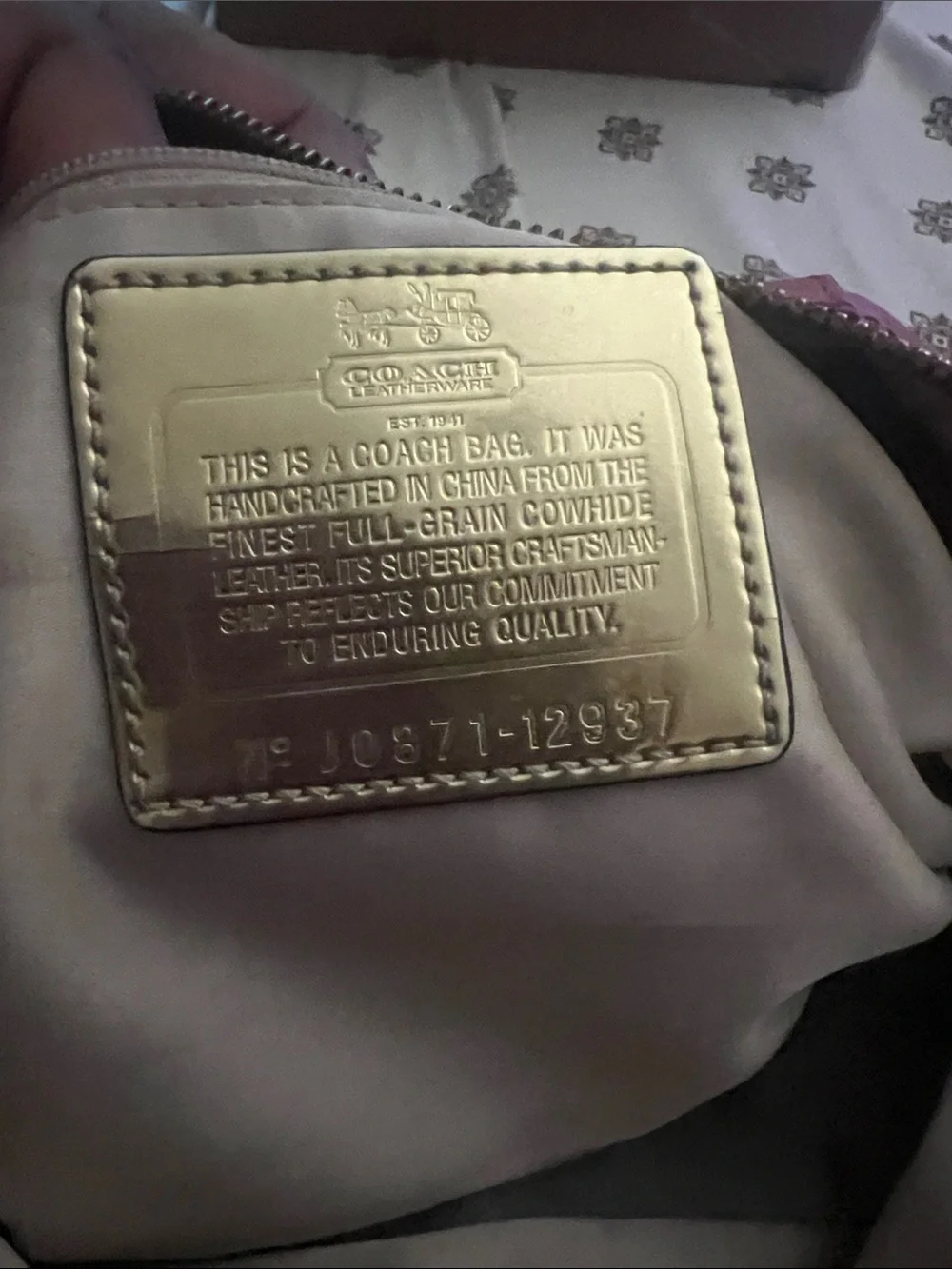 Coach Coral-Red Leather Satchel with Gold Accents